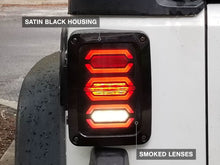 Load image into Gallery viewer, Raxiom 07-18 Jeep Wrangler JK LED Tail Lights- Black Housing (Smoked Lens) Tail Lights Raxiom