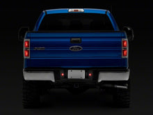 Load image into Gallery viewer, Raxiom 10-14 Ford F-150 Axial Series LED License Plate Lamps- Red and White Bulbs Raxiom
