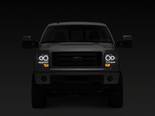 Load image into Gallery viewer, Raxiom 09-14 Ford F-150 G2 Super White LED Halo Projector Headlights- Black Housing- Clear Lens | T542835