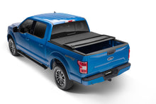 Load image into Gallery viewer, Lund 04-17 Nissan Titan (5.5ft. Bed w/o Titan Box) Genesis Elite Tri-Fold Tonneau Cover - Black LUND