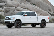 Load image into Gallery viewer, Fabtech 09-13 Ford F150 4WD 4in Perf Sys w/Dlss 2.5 C/O Resi & Rr Dlss Coilovers Fabtech