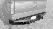 Load image into Gallery viewer, Addictive Desert Designs 10-14 Ford F-150 Raptor HoneyBadger Rear Bumper w/ Tow Hooks Addictive Desert Designs