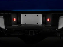 Load image into Gallery viewer, Raxiom 10-14 Ford F-150 Axial Series LED License Plate Lamps- Red and White Bulbs Raxiom