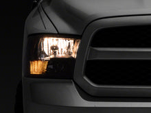 Load image into Gallery viewer, Raxiom 09-18 Dodge RAM 1500 Axial Series Euro Style Headlights w/ Dual Bulb Blk Housing (Clear Lens) Headlights Raxiom