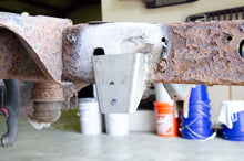 Load image into Gallery viewer, Rust Buster 09-18 Dodge Ram 1500 All Cab/Bed Config. Sway Bar Link Bracket - Left | RB7746L