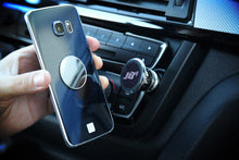 Load image into Gallery viewer, JB4 magnetic phone mount by Burger Motorsports attached to car air vent holding a smartphone