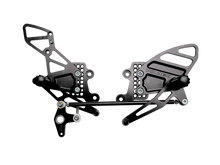 Load image into Gallery viewer, Vortex Racing Bike Stands Vortex Racing 04-07 Honda CBR1000RR,03-06 CBR6100 RR Adjustable Rearsets- Black