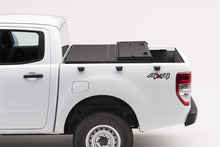 Load image into Gallery viewer, Extang 05-16 Nissan Frontier(5ft Bed) (w/ or w/o Track Sys) (5ft) Solid Fold 2.0 Bed Covers - Folding Extang