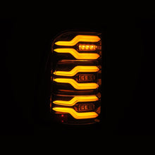 Load image into Gallery viewer, AlphaRex 19-21 Dodge Ram 1500 Luxx-Series LED Tail Lights Alpha-Black w/Activ Light/Seq Signal Tail Lights AlphaRex