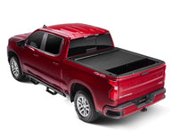 Load image into Gallery viewer, Roll-N-Lock 2020 Chevy Silverado / GMC Sierra 2500-3500 80-1/2in M-Series Retractable Tonneau Cover Tonneau Covers - Retractable Roll-N-Lock