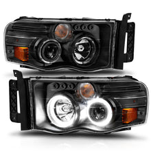 Load image into Gallery viewer, ANZO 2002-2005 Dodge Ram 1500 Projector Headlights w/ Halo Black Clear Amber Headlights ANZO