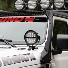 Load image into Gallery viewer, Go Rhino Xplor Blackout Series Round LED Driving Light w/DRL (Surface/Threaded Stud Mnt) 7in. - Blk Light Bars & Cubes Go Rhino
