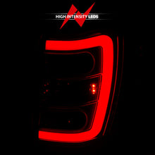 Load image into Gallery viewer, ANZO 1999-2004 Jeep Grand Cherokee LED Tail Lights w/ Light Bar Chrome Housing Red/Clear Lens Tail Lights ANZO