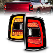 Load image into Gallery viewer, ANZO 09-18 Dodge Ram 1500 Sequential LED Taillights Black w/Switchback Amber Signal Tail Lights ANZO
