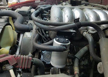 Load image into Gallery viewer, J&L 95-04 Toyota Tacoma/4Runner 3.4L Driver Side Oil Separator 3.0 - Clear Anodized Oil Separators J&L