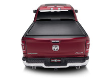 Load image into Gallery viewer, Truxedo 19-20 Ram 1500 (New Body) w/o Multifunction Tailgate 6ft 4in Deuce Bed Cover Bed Covers - Folding Truxedo
