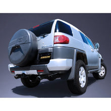 Load image into Gallery viewer, Gibson 07-14 Toyota FJ Cruiser Base 4.0L 2.5in Cat-Back Dual Split Exhaust - Stainless Catback Gibson