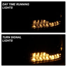 Load image into Gallery viewer, xTune Dodge Ram 13-17 ( w/ Factory Projector LED) Projector Headlight - Black HD-JH-DR13-P-BK Headlights SPYDER