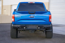 Load image into Gallery viewer, Addictive Desert Designs ADDR181231280103 Addictive Desert Designs 15-18 Ford F-150 Stealth Fighter Rear Bumper w/ Backup Sensor Cutout