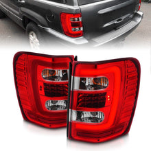 Load image into Gallery viewer, ANZO ANZ311396 ANZO 1999-2004 Jeep Grand Cherokee LED Tail Lights w/ Light Bar Chrome Housing Red/Clear Lens