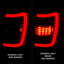 Load image into Gallery viewer, ANZO ANZ311396 ANZO 1999-2004 Jeep Grand Cherokee LED Tail Lights w/ Light Bar Chrome Housing Red/Clear Lens