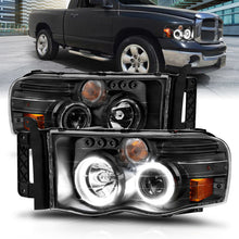 Load image into Gallery viewer, ANZO 2002-2005 Dodge Ram 1500 Projector Headlights w/ Halo Black Clear Amber Headlights ANZO