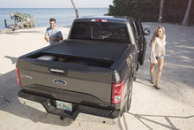 Load image into Gallery viewer, Roll-N-Lock 07-17 Toyota Tundra Crew Max Cab 65in E-Series Retractable Tonneau Cover Tonneau Covers - Retractable Roll-N-Lock