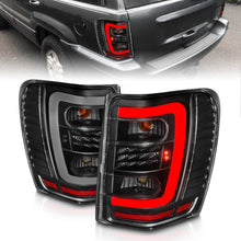 Load image into Gallery viewer, ANZO 1999-2004 Jeep Grand Cherokee LED Tail Lights w/ Light Bar Black Housing Clear Lens Tail Lights ANZO