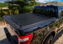 Load image into Gallery viewer, Roll-N-Lock RNLLG226M Roll-N-Lock 2020 Chevy Silverado / GMC Sierra 2500-3500 80-1/2in M-Series Retractable Tonneau Cover