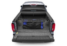 Load image into Gallery viewer, Roll-N-Lock RNLCM226 Roll-N-Lock 2020 Chevy Silverado/Sierra 2500/3500 MB 80-1/2in Cargo Manager