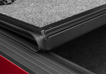 Load image into Gallery viewer, UnderCover 09-19 Dodge Ram 76.8in Fusion Bed Cover - Brilliant Black Undercover
