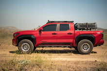 Load image into Gallery viewer, DV8 Offroad 24-25 Toyota Tacoma Double Cab Rock Sliders
