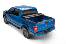 Load image into Gallery viewer, Lund 04-17 Nissan Titan (5.5ft. Bed w/o Titan Box) Genesis Elite Tri-Fold Tonneau Cover - Black LUND
