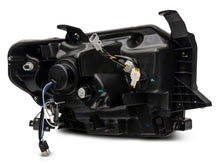 Load image into Gallery viewer, Raxiom 14-21 Toyota Tundra Axial Projector Headlights w/ SEQL LED Bar- Blk Housing (Clear Lens) Headlights Raxiom
