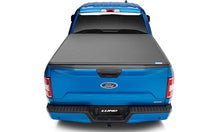 Load image into Gallery viewer, Lund 04-17 Nissan Titan (5.5ft. Bed w/o Titan Box) Genesis Elite Tri-Fold Tonneau Cover - Black LUND
