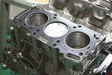 Load image into Gallery viewer, GReddy 09+ Nissan GTR R35 VR38DETT 0.8mm Thick 96mm Bore Metal Head Gaskets (Set of 2) | 13521400
