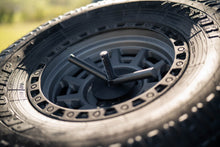 Load image into Gallery viewer, DV8 Offroad 2020+ Jeep Gladiator JT Adjustable In-Bed Tire Carrier
