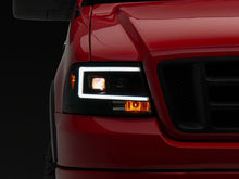 Load image into Gallery viewer, Raxiom 04-08 Ford F-150 Axial Series Projector Headlights- Black Housing- Clear Lens | T569352
