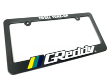 Load image into Gallery viewer, GReddy Total Tune Up License Plate Frame - 3 Color | 21112000
