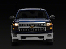 Load image into Gallery viewer, Raxiom 14-15 Chevrolet Silverado 1500 OE Style Headlights/ Black Trim- Black - Clear Lens | S169260
