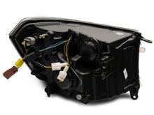 Load image into Gallery viewer, Raxiom 09-18 Dodge RAM 1500/2500/3500 Axial Headlights w/ SEQL LED Bar- Blk Housing (Clear Lens) Headlights Raxiom
