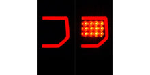 Load image into Gallery viewer, Raxiom 07-13 Toyota Tundra Axial Series Dual C-Shape LED Tail Lights- Black Housing- Clear Lens | TU9916
