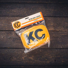 Load image into Gallery viewer, KC HiLiTES Retro 5in x 7in Rectangular Yellow Vinyl Light Cover w/ Black KC Logo (Pair) KC HiLiTES
