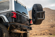 Load image into Gallery viewer, DV8 18-25 Jeep Wrangler JL Body Mounted Tire Carrier
