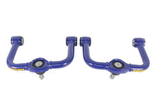 Load image into Gallery viewer, Superpro 05-21 Nissan Frontier - Fixed Offset Upper Control Arm Set - Camber/Caster Correction Superpro
