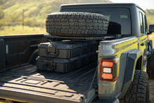 Load image into Gallery viewer, DV8 Offroad 2020+ Jeep Gladiator JT Adjustable In-Bed Tire Carrier
