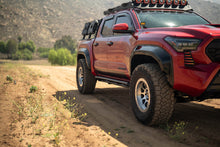 Load image into Gallery viewer, DV8 Offroad 24-25 Toyota Tacoma Double Cab Rock Sliders
