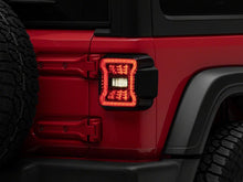 Load image into Gallery viewer, Raxiom 18-26 Jeep Wrangler JL LED Tail Lights- Red Housing- Smoked Lens | J181425
