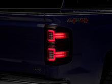 Load image into Gallery viewer, Raxiom 14-18 Chevrolet Silverado 1500 LED Taillights w/ SEQL Turn Signals- Blk Housing (Clear Lens) Lights Corner Raxiom
