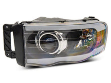 Load image into Gallery viewer, Raxiom 02-05 Dodge RAM 1500 LED Projector Headlights w/ SEQL LED Bar- Blk Housing (Clear Lens) Headlights Raxiom
